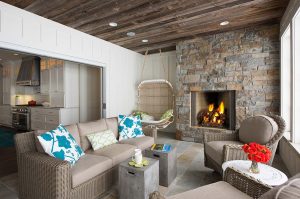 Shoreham Stone fireplace in sitting room in Minnesota Lake Home