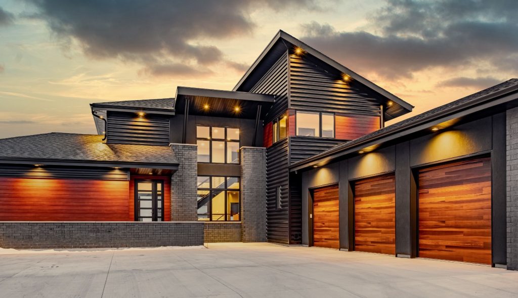 Striking Contemporary Home with three stall garage and peaked roof