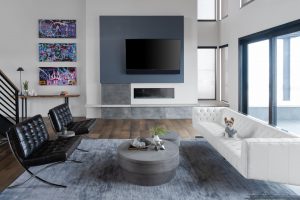 Modern Living room with art and fireplace in Custom Built Home