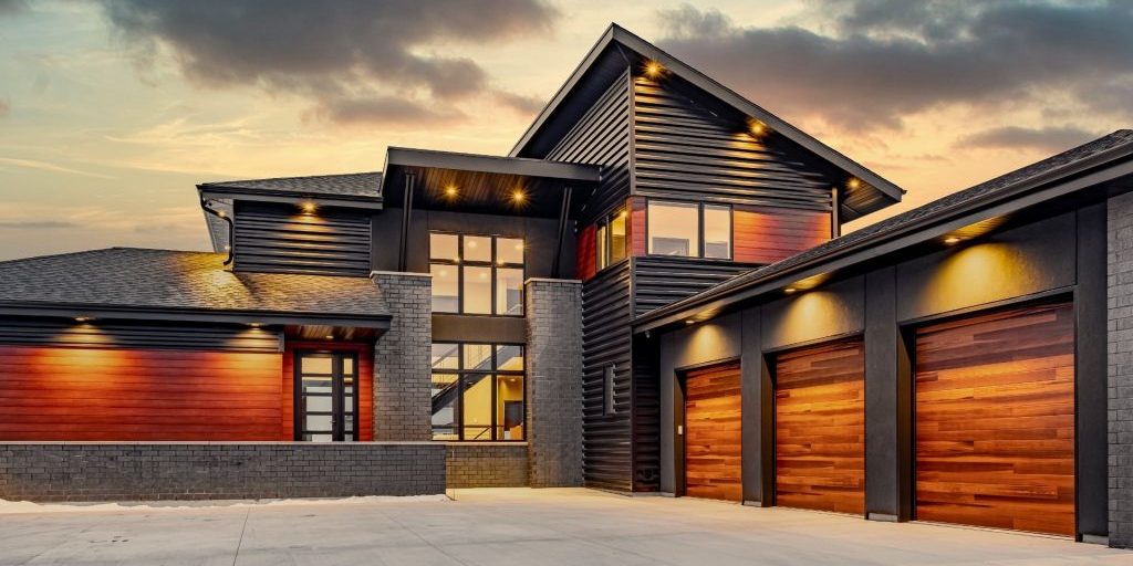 Striking Contemporary Home with three stall garage and peaked roof